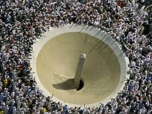 A group of Hajjis performing the Tawaf ritual
