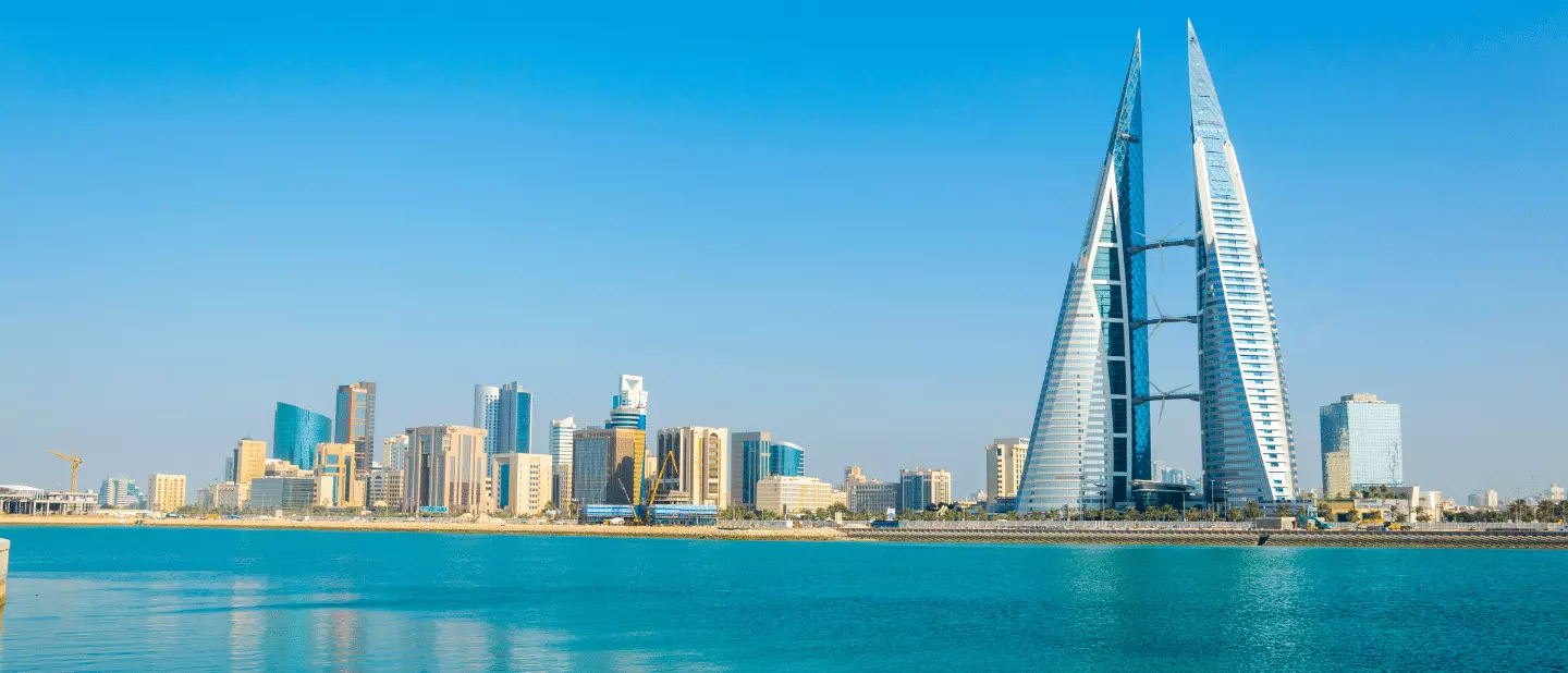 Dazzling Bahrain Skyline with Glittering Waters - Explore Bahrain's Modern Splendor with Supreme Air Travels' Visa Services